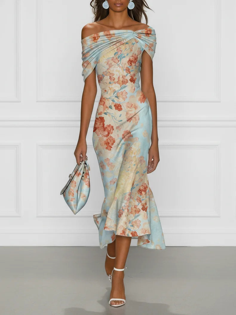 Off-shoulder midi mermaid dress in blue floral print, sleeveless with draped neckline