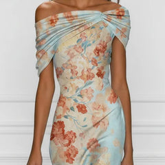 Off-shoulder midi mermaid dress close-up, blue floral print with ruched draped neckline