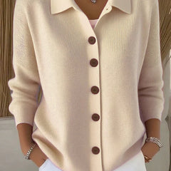 Cream button-front collared cardigan sweater with long sleeves, button placket