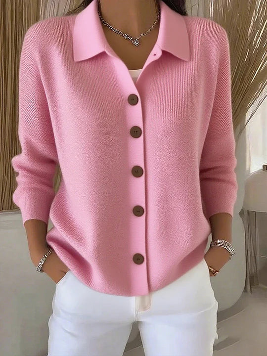 Pink button-front collared cardigan sweater with long sleeves, ribbed knit