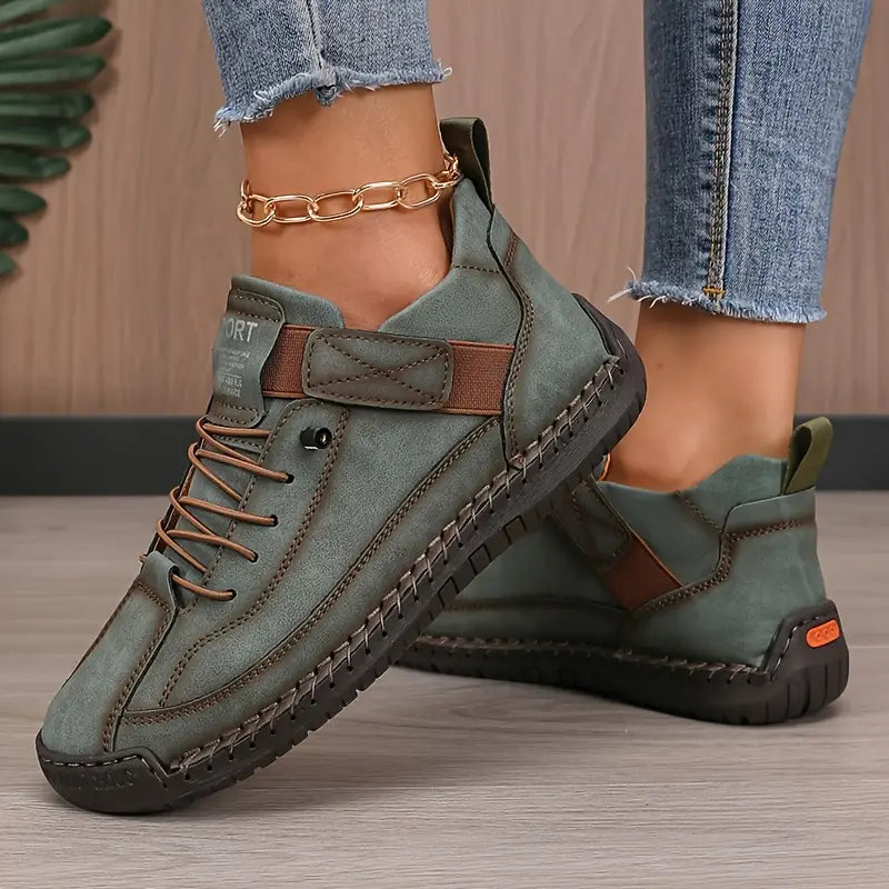 Green orthopaedic trainers, lace-up with stitched side panel and cushioned sole