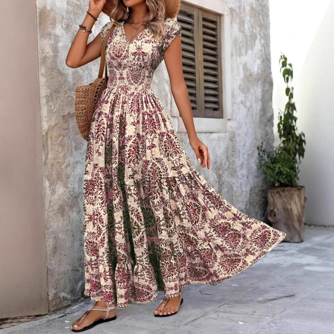 Pink V-neck shirred boho maxi dress with short sleeves and ornate floral print