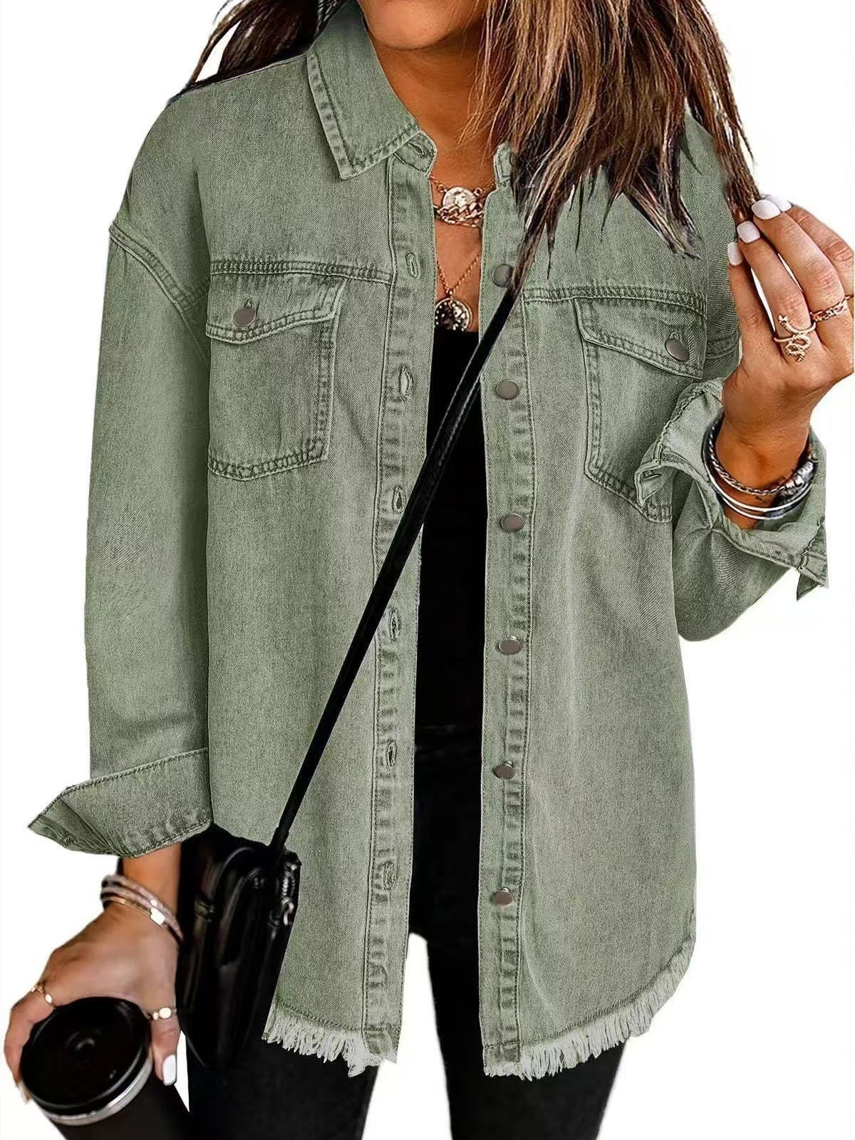 Olive green denim jacket with button front, chest pockets, and frayed hem.