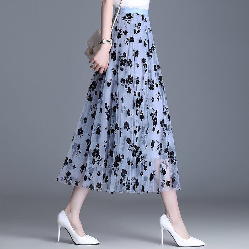 Light blue midi tulle skirt with dark navy floral print and elastic waistband