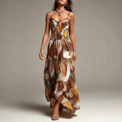 Abstract print smocked tiered maxi dress with flowing tiers and spaghetti straps