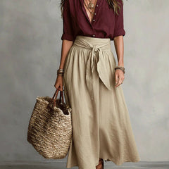 Burgundy blouse top and beige midi skirt two-piece set, front view