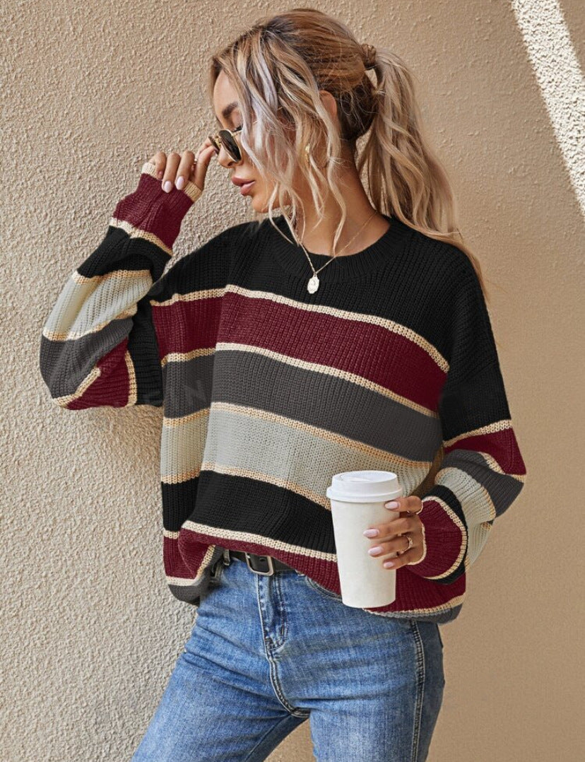 Striped long-sleeve round-neck sweater in black, burgundy, and cream