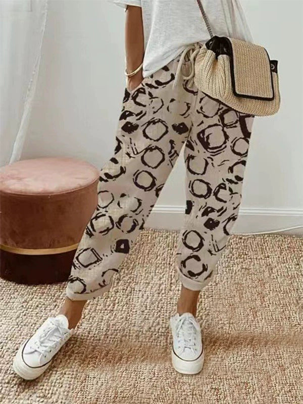 BROOKE breathable casual trousers with beige base and black abstract ring print