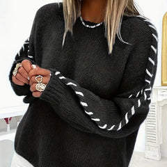 Round-neck long-sleeve sweater in black with contrast stitched sleeve trim
