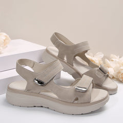 Beige supportive orthopaedic sandals with two hook-and-loop straps and padded footbed