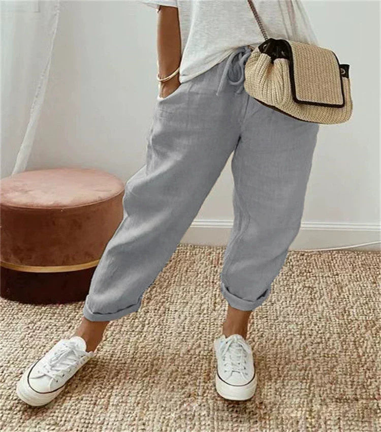 Light gray breathable casual trousers with cuffed ankles and side pockets