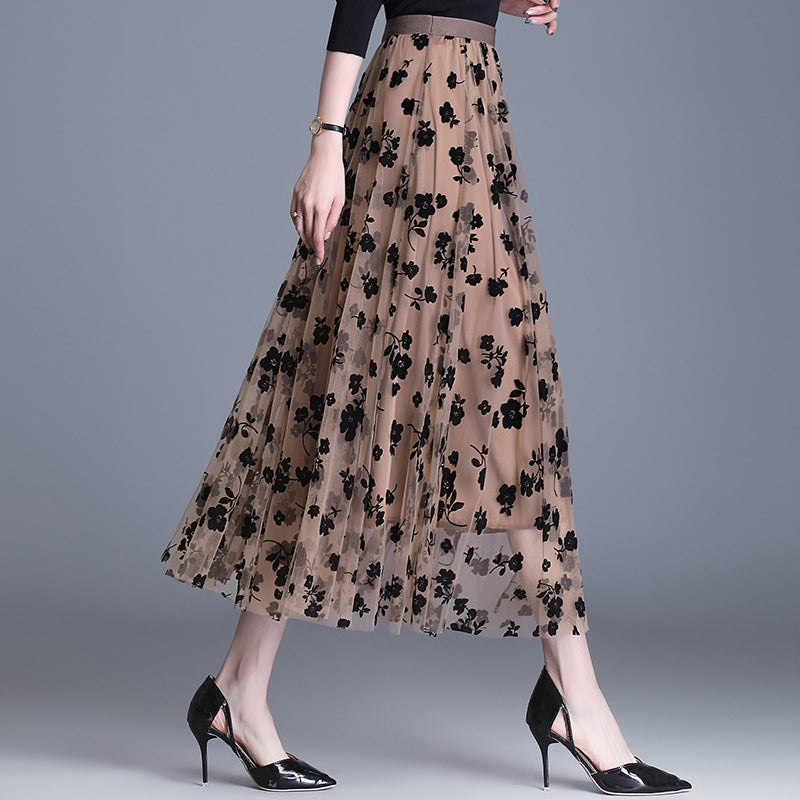 Beige midi tulle skirt with black floral pattern and elastic waistband