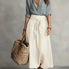 Blue blouse top and cream midi skirt two-piece set, front view