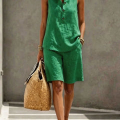 Green sleeveless henley top and matching shorts two-piece set