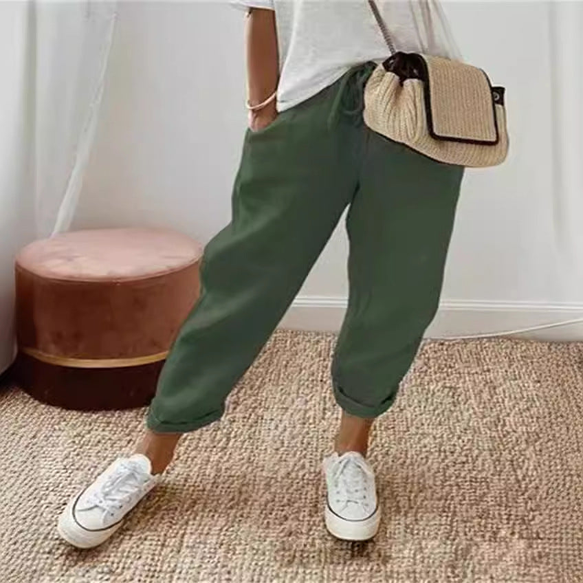 Breathable casual trousers in dark green, relaxed fit with ankle-length cuffs