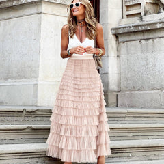 Pink maxi layered cake skirt with tiered ruffle layers and gathered waistline