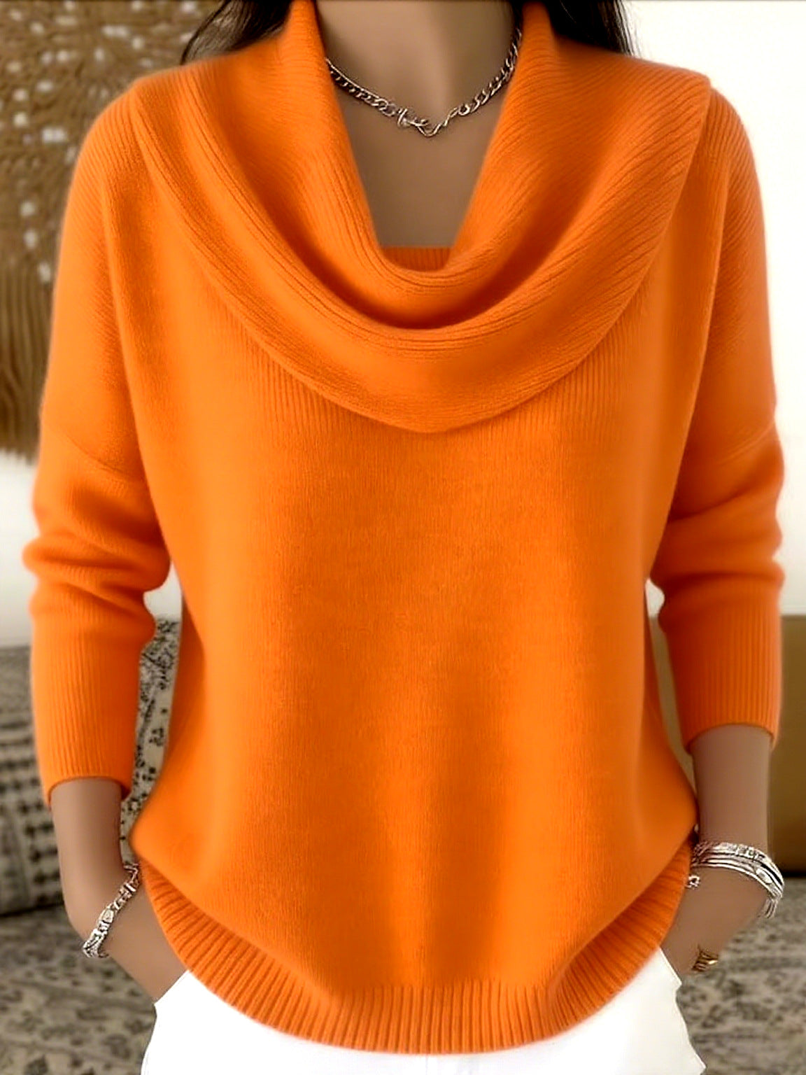 Orange cowl-neck sweater with long sleeves and ribbed hem and cuffs.