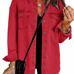 Red denim jacket with button front, chest pockets, and frayed hem.