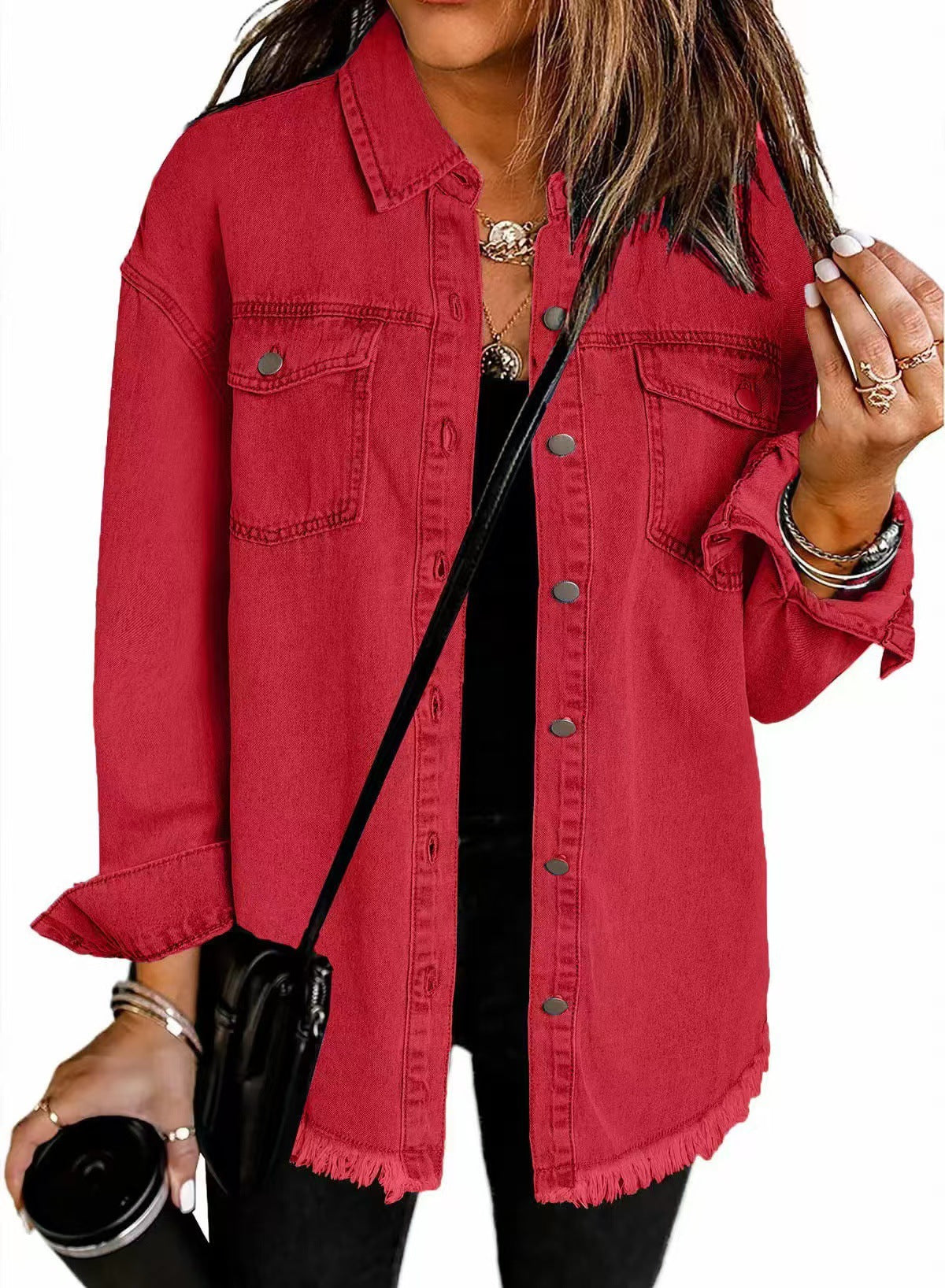 Red denim jacket with button front, chest pockets, and frayed hem.