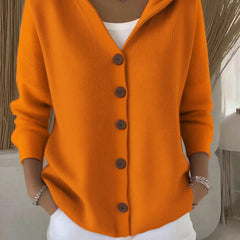 Orange hooded button-up knit cardigan with dark buttons, long sleeves