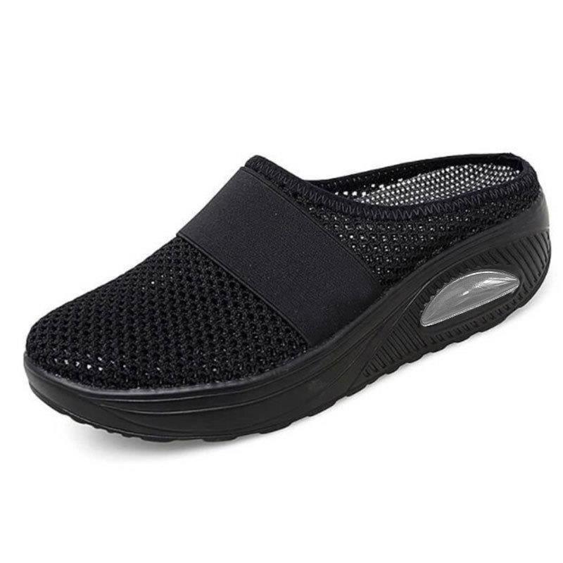Breathable orthopaedic slip-on mules, black knit upper with wide strap, cushioned air sole