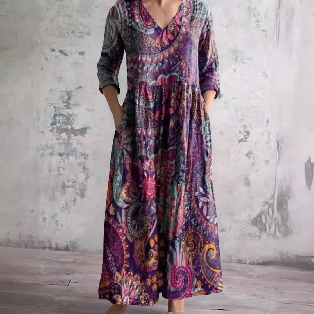 Purple floral boho dress with V-neck, three-quarter sleeves and tiered gathered skirt