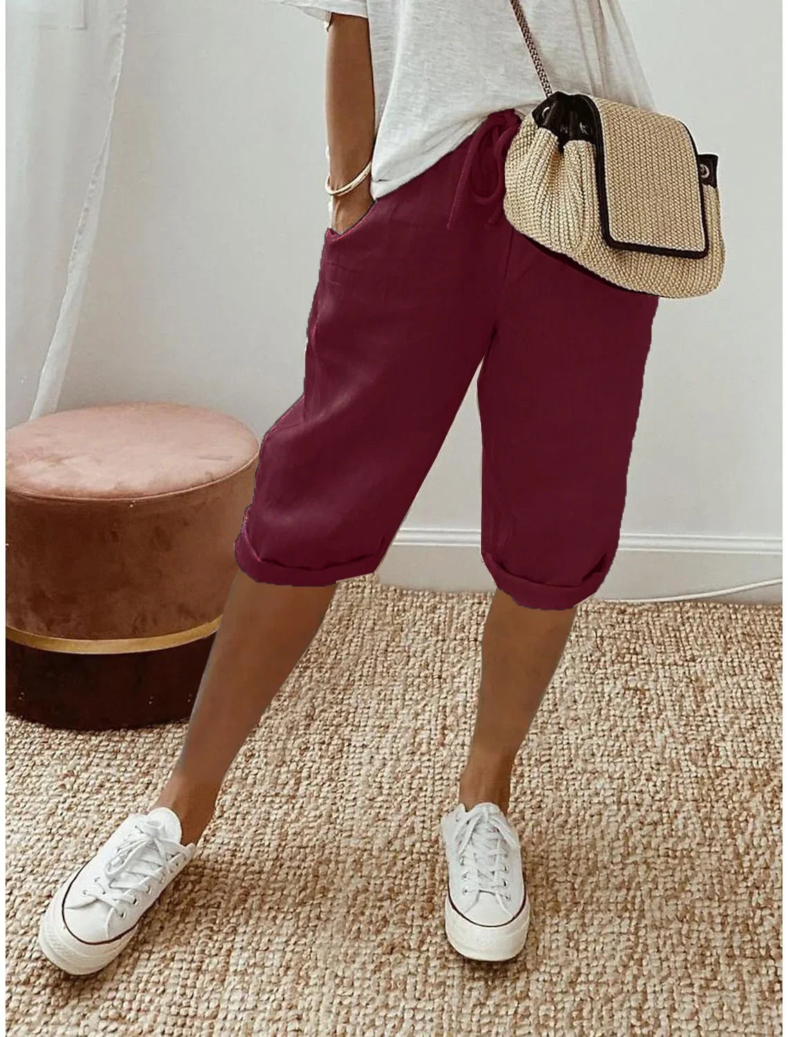 Lightweight summer shorts in wine red, cuffed hem and elastic waist with pockets