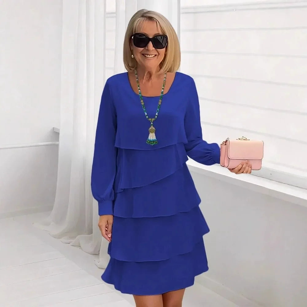 Blue ruffle tier long-sleeve dress with layered skirt, round neckline