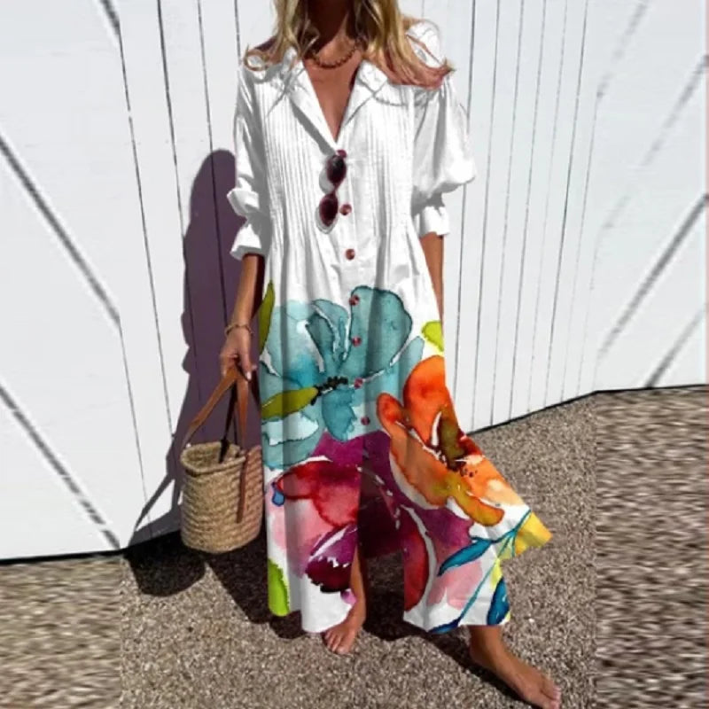 Boho maxi dress with colorful abstract animal-style print on white background, button front