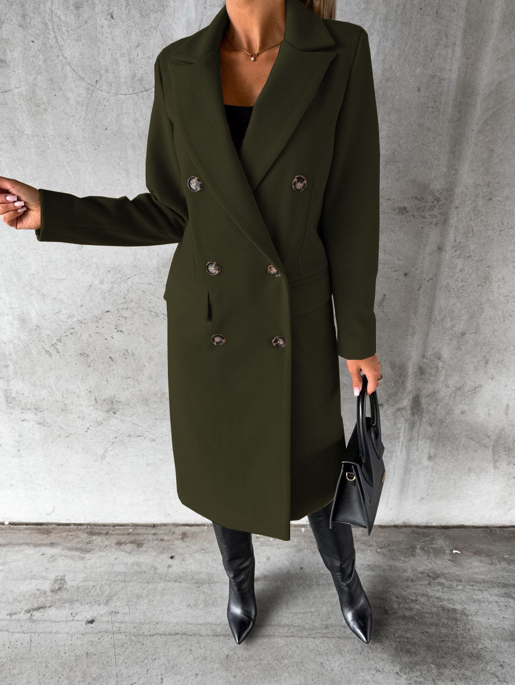 Military green longline double-breasted coat with notched lapels and flap pockets