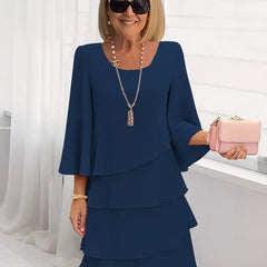 Navy ruffle dress with long bell sleeves and layered tier skirt, scoop neckline
