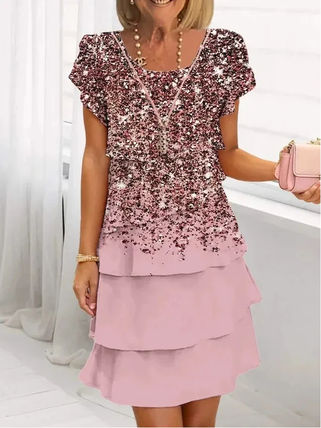 Light pink ruffle dress with sequin sparkle bodice and layered tier skirt