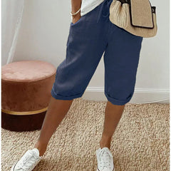 Lightweight summer shorts in navy blue, cuffed hem and elastic waist