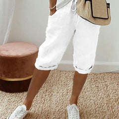 Lightweight summer shorts in white, cuffed hem and elastic waist with pockets