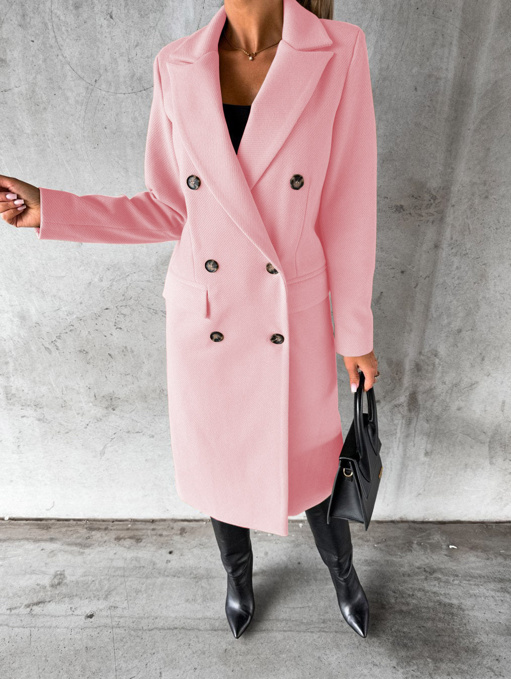Soft pink longline double-breasted coat with notched lapels and flap pockets