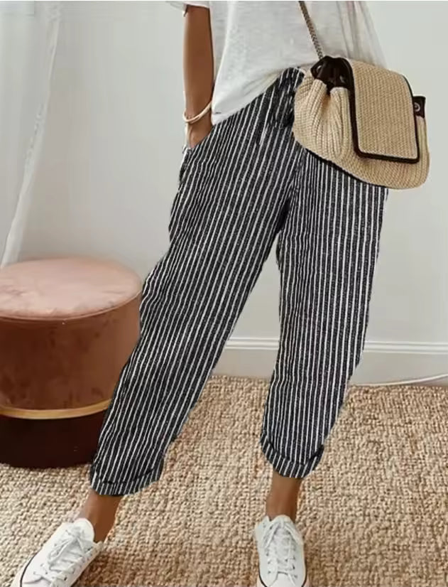 Felicity breathable pinstripe trousers with cuffed ankle hem, dark color.