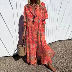Boho maxi dress in coral red with decorative motif print, V-neck, button front