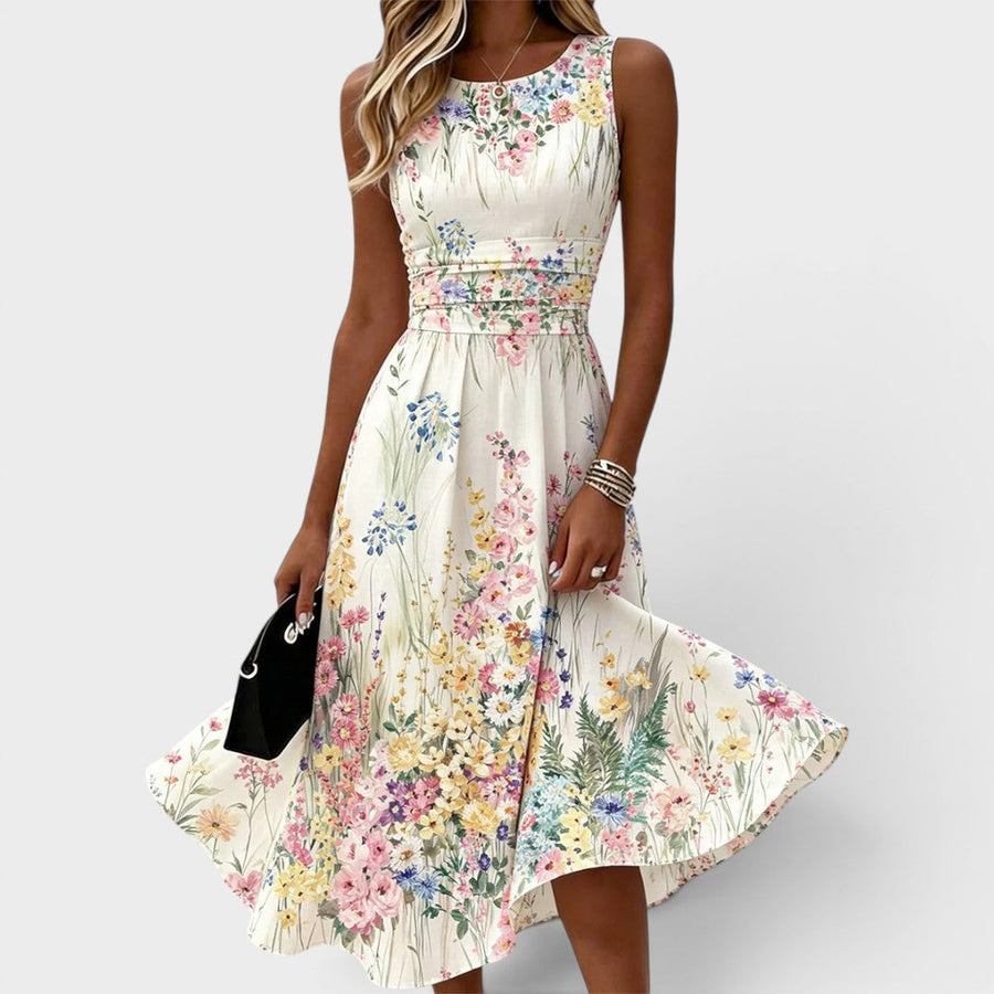 White sleeveless floral midi dress with cinched waist and gathered skirt