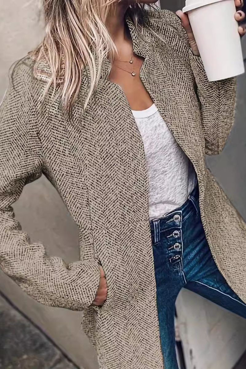 Textured gray blazer with notched lapels, long sleeves, and open front