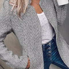 Textured gray herringbone blazer, side view with notched lapels