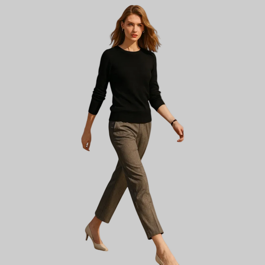 Women’s black O-neck knit sweater with long sleeves and ribbed waistband