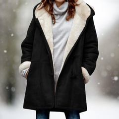 Sherpa-lined warm fall jacket in black with front pockets and button closure