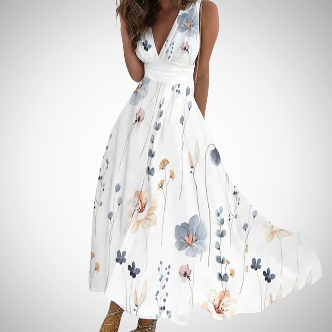 White floral maxi dress with blue and peach blossoms, sleeveless V-neck, gathered waist