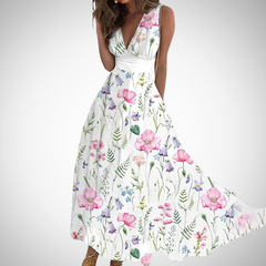 White floral maxi dress with pink and purple blooms, sleeveless V-neck, gathered waist
