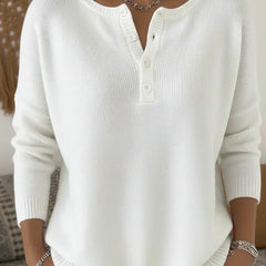 White henley button-up knit sweater with henley neckline and buttons
