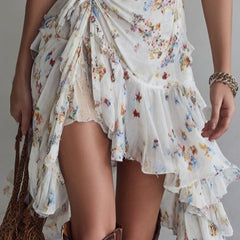 White floral tiered mini dress with ruffled hem and V-neck spaghetti straps
