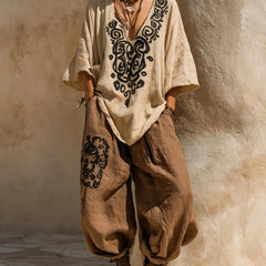 Set boho nomad: kimono chiaro, tunica crema ricamata e pantaloni ampi marroni