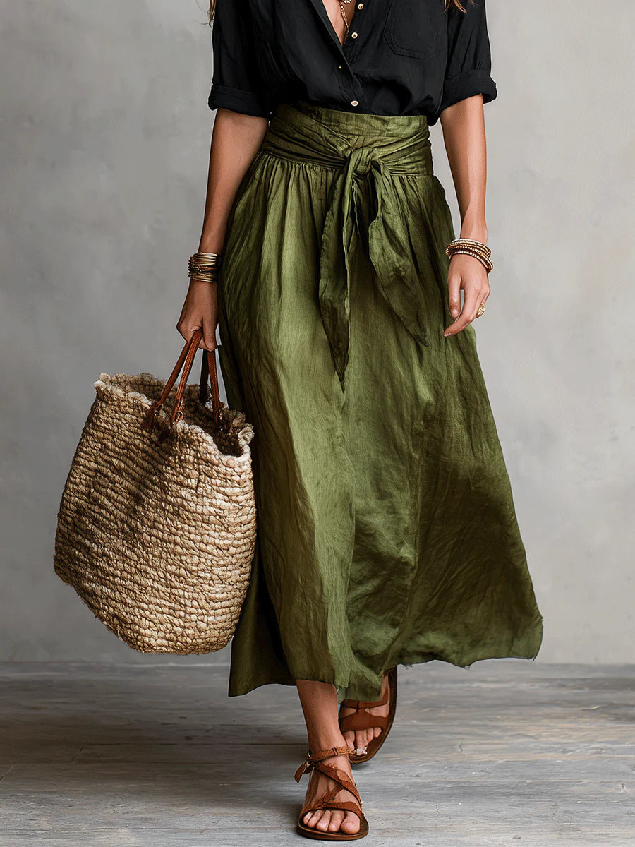 Black blouse top and olive green midi skirt two-piece set, full view with tied waist