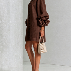 Dark brown button-front midi dress with front buttons and large flower applique on sleeves