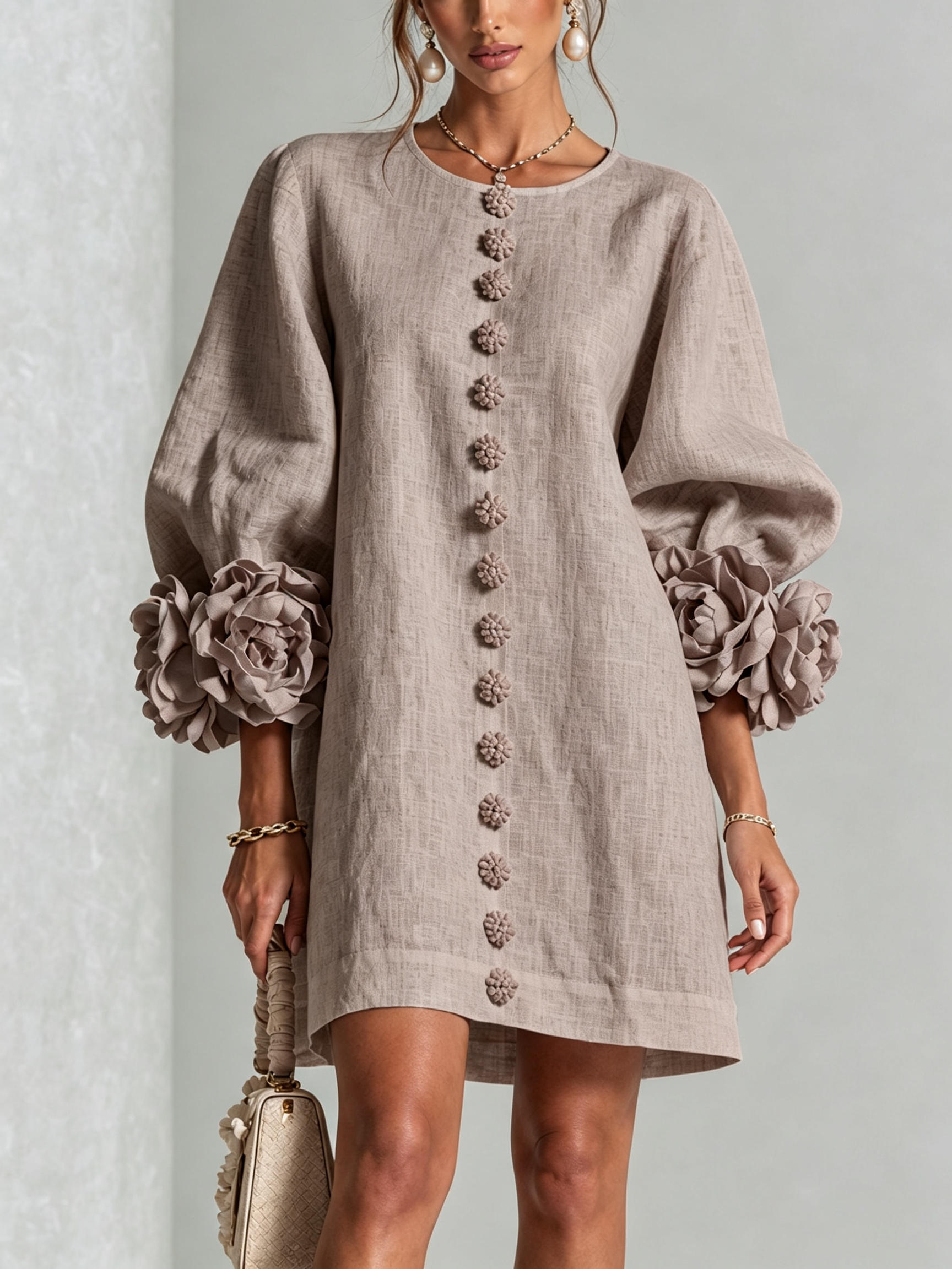 Taupe button-front midi dress with round neckline and rosette puff sleeves